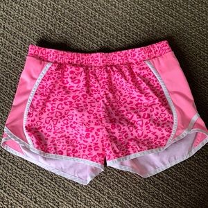Pink leopard print athletic shorts